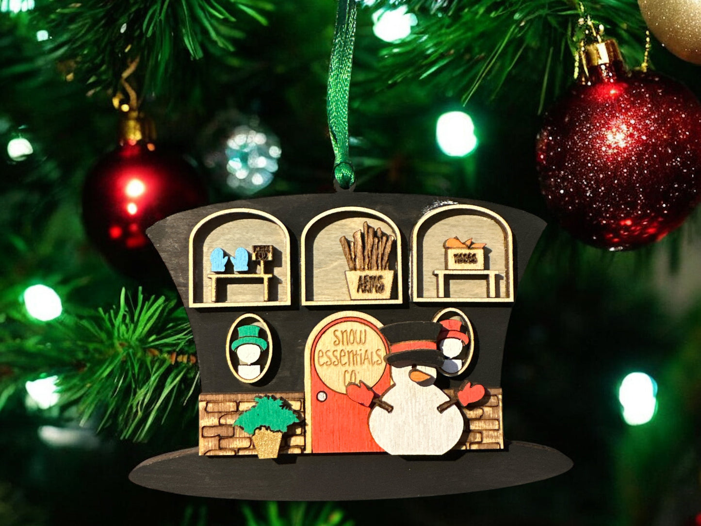 Snow essentials top hat ornament